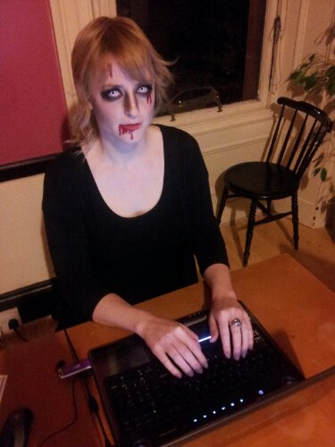 and now I'm sitting in the kitchen writing this flog post.  Not taking my makeup off, no sir.